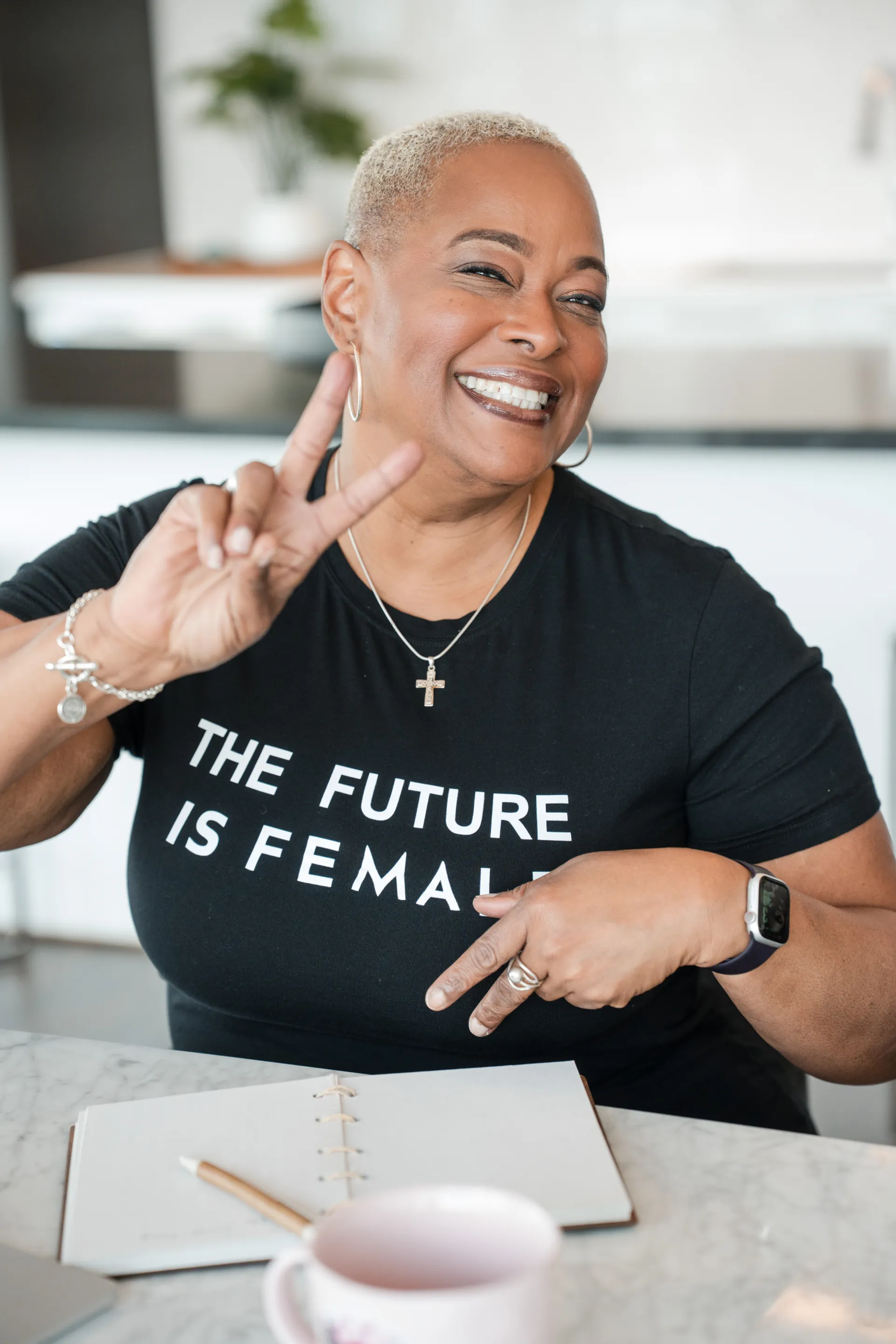 Chef Lisa Brooks making a peace sign